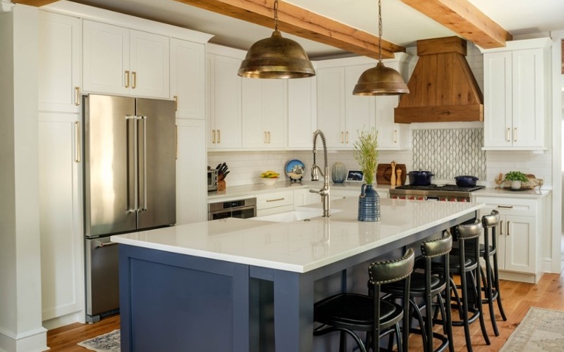 West Chester Borough updated kitchen with blue island cabinets and wooden ceiling beams