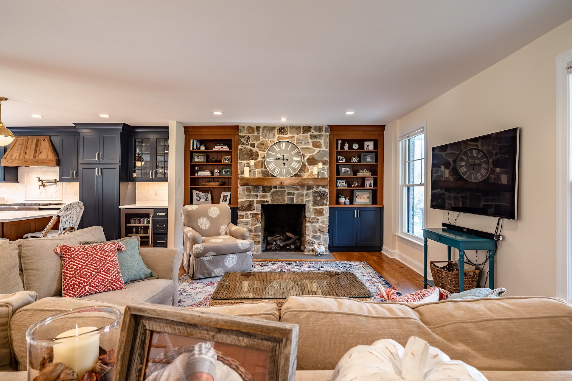 Living room with stone fireplace