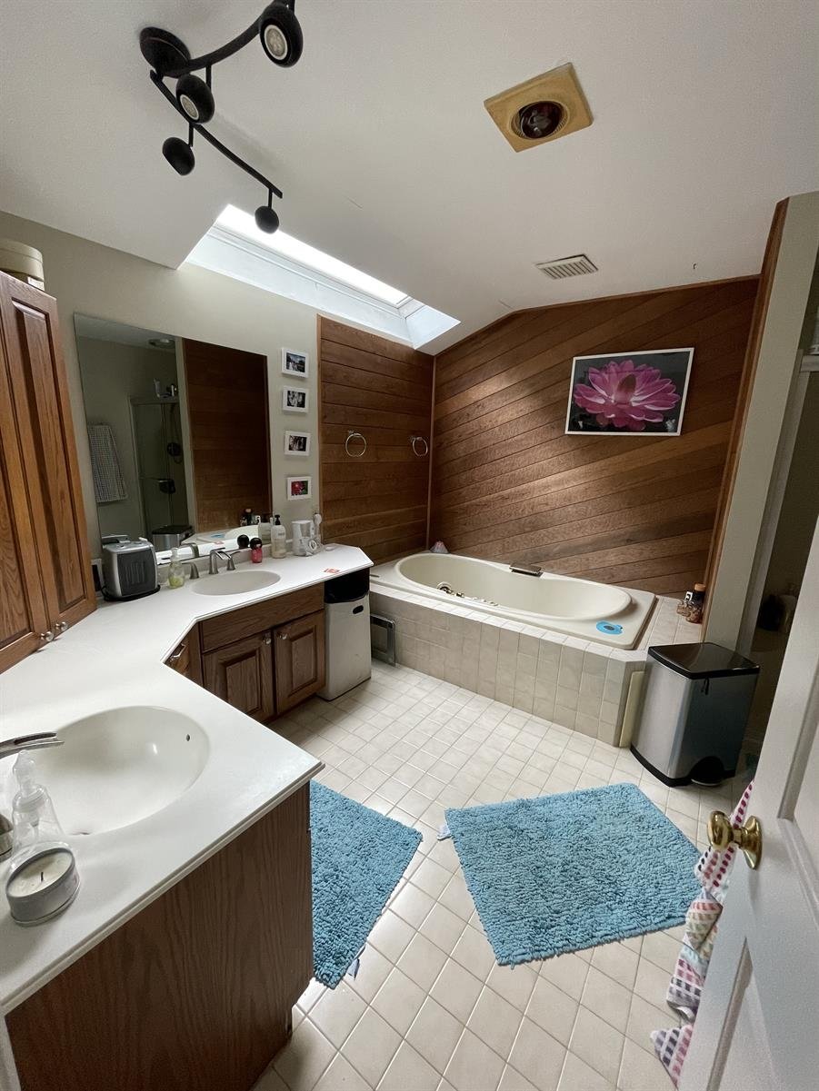 Dark brown bathroom before being remodeled