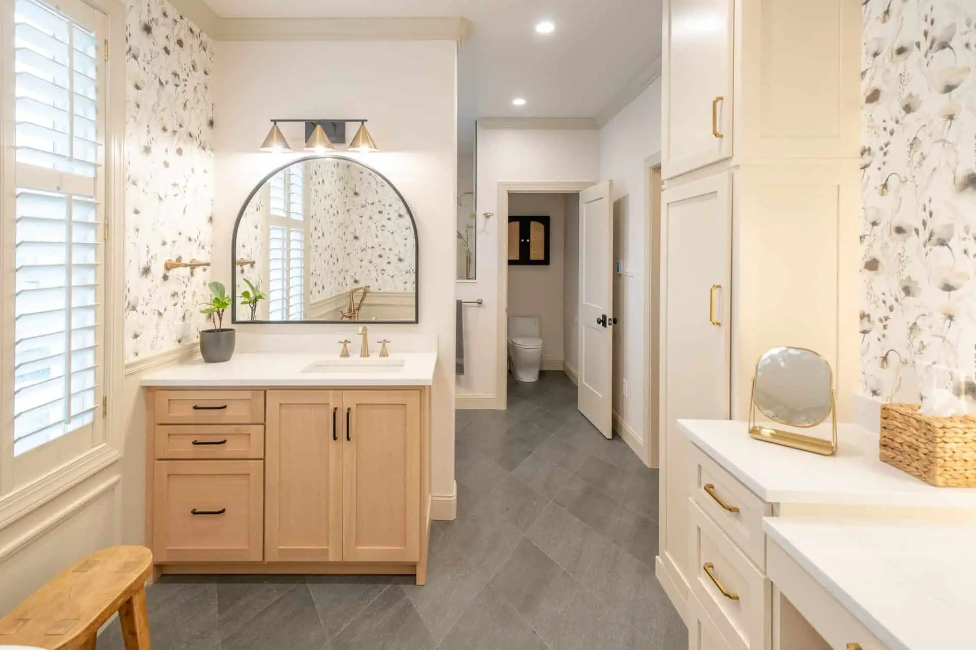 Leveling Up Your Bathroom Remodel with a Modern Bathroom Vanity 4 Single vanity in a bathroom beneath a wall mirror - modern bathroom vanity