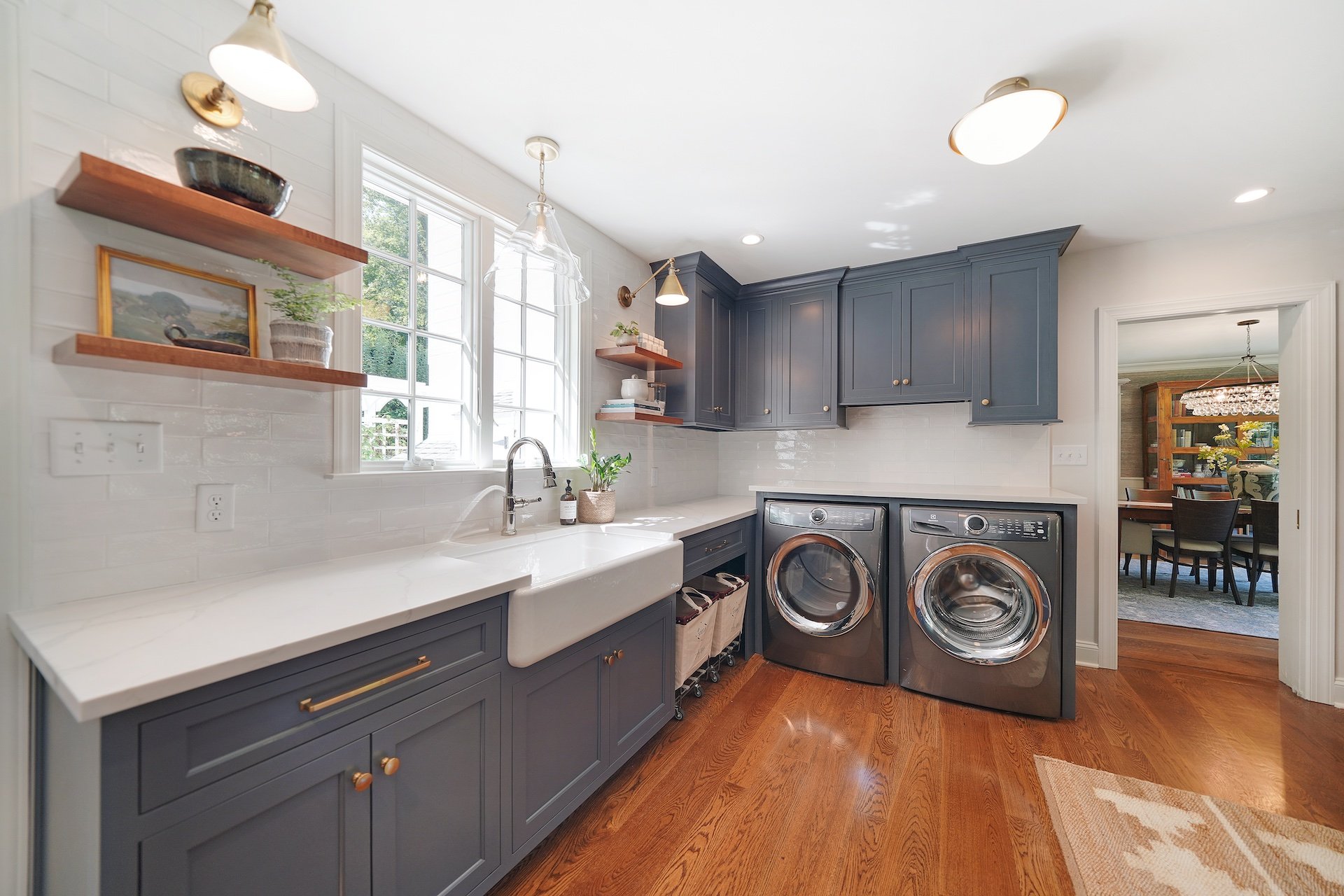 Must-Ask Questions Before You Ink a Contract for Home Addition Services 1 Custom laundry room cabinets in blue