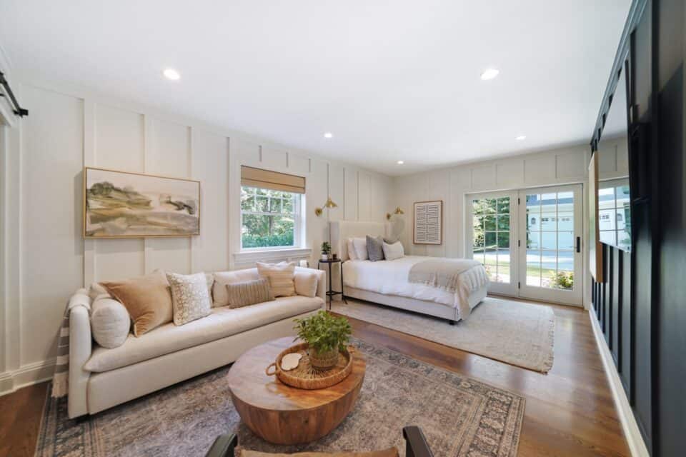 Sun-filled guest suite with seating area - 2024 remodeling trends