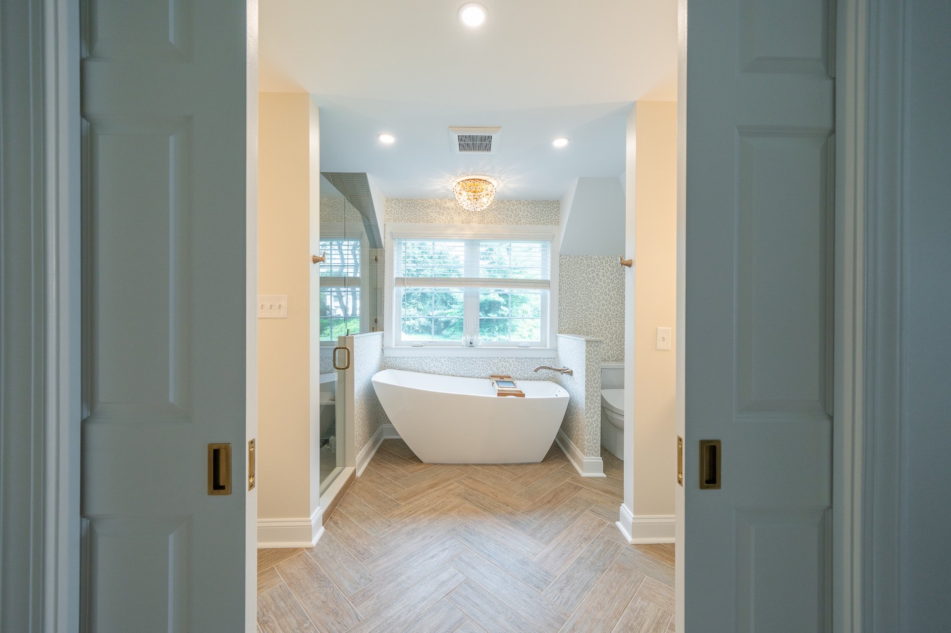Bath Remodeling in West Chester PA: A Local Architect’s Perspective 1 Soaking tub behind dual pocket doors
