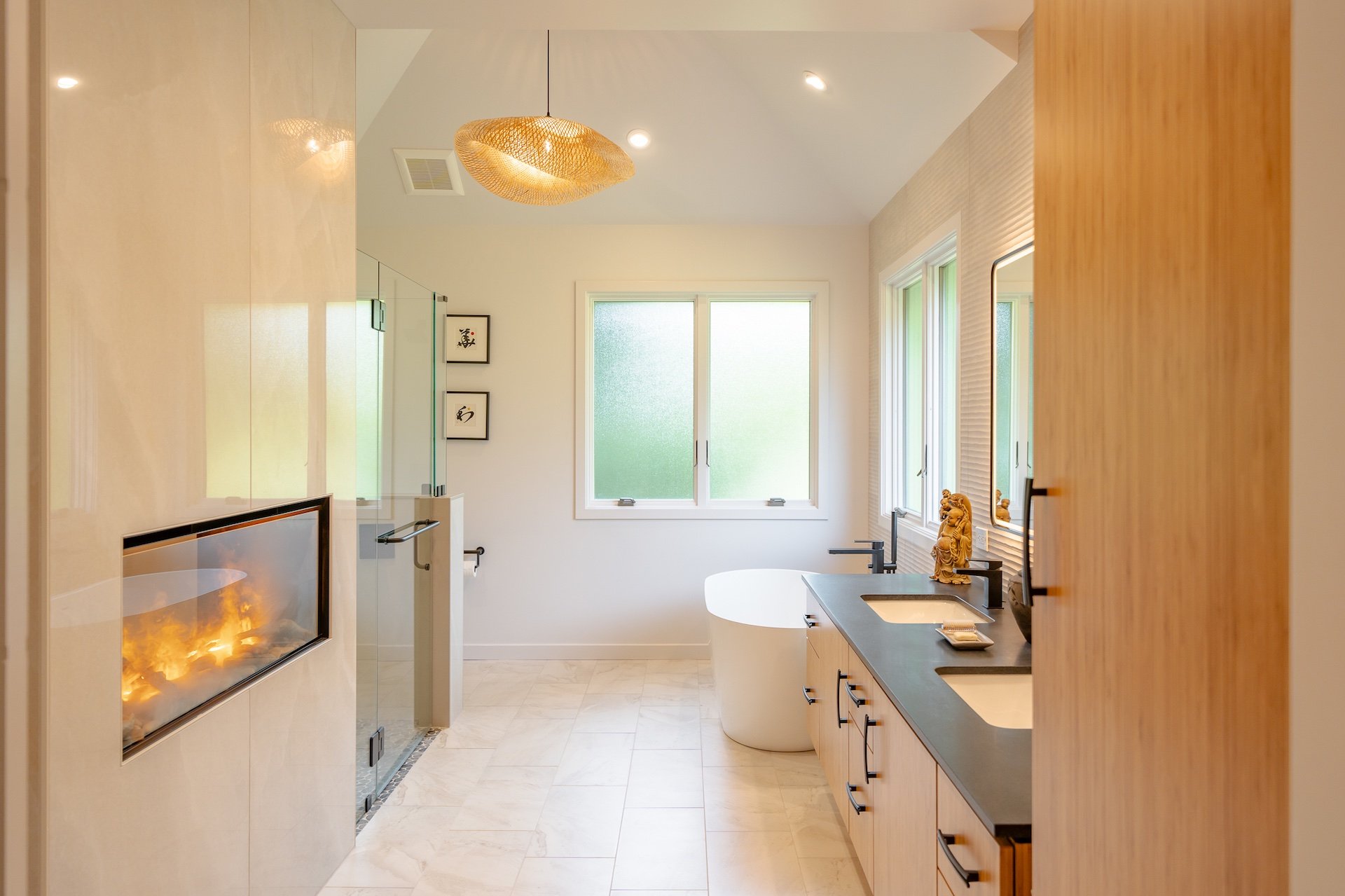Is It Time to Update Your Bathroom? 5 Remodeled bathroom with in-wall fireplace