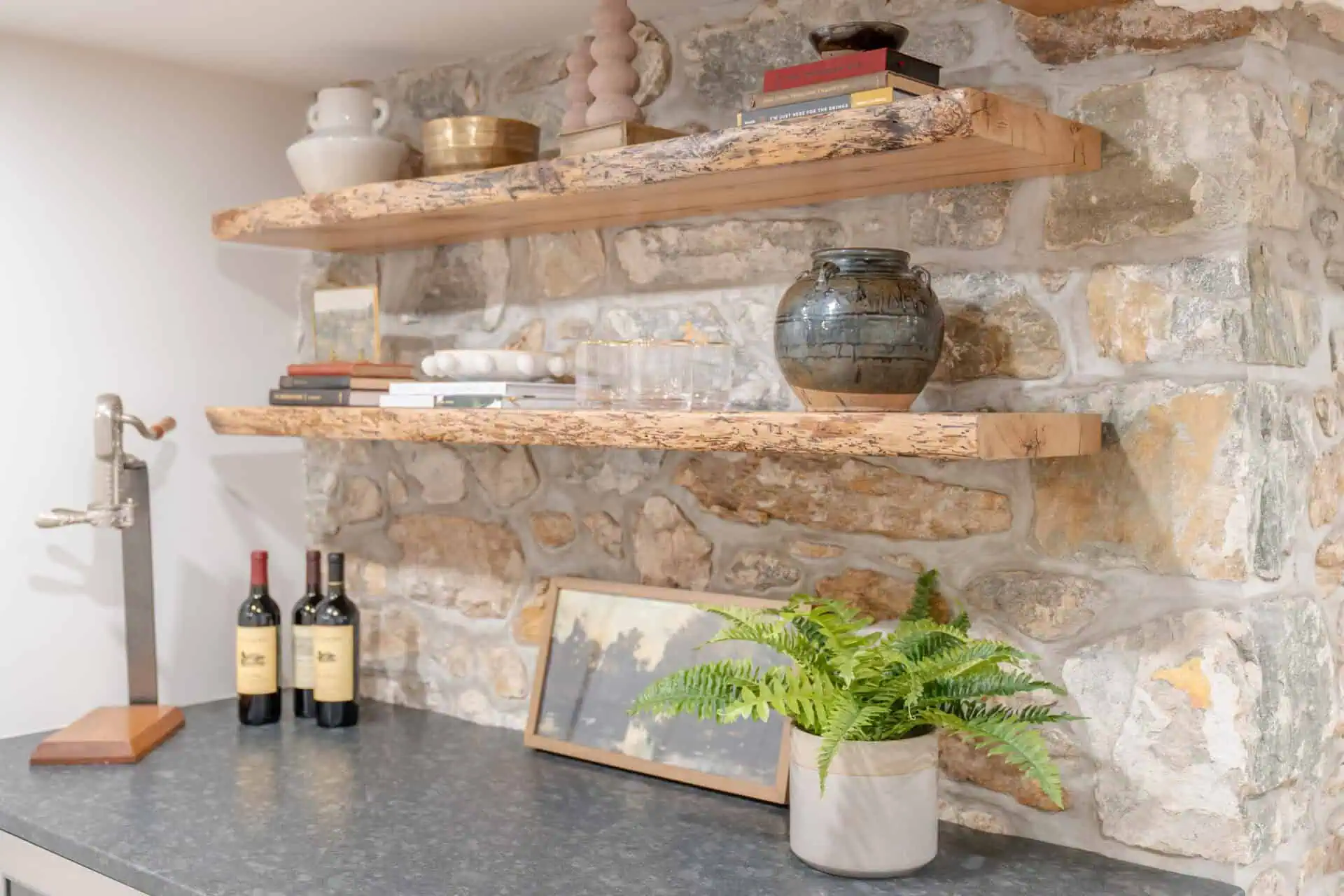 Exposed stone in renovated basement