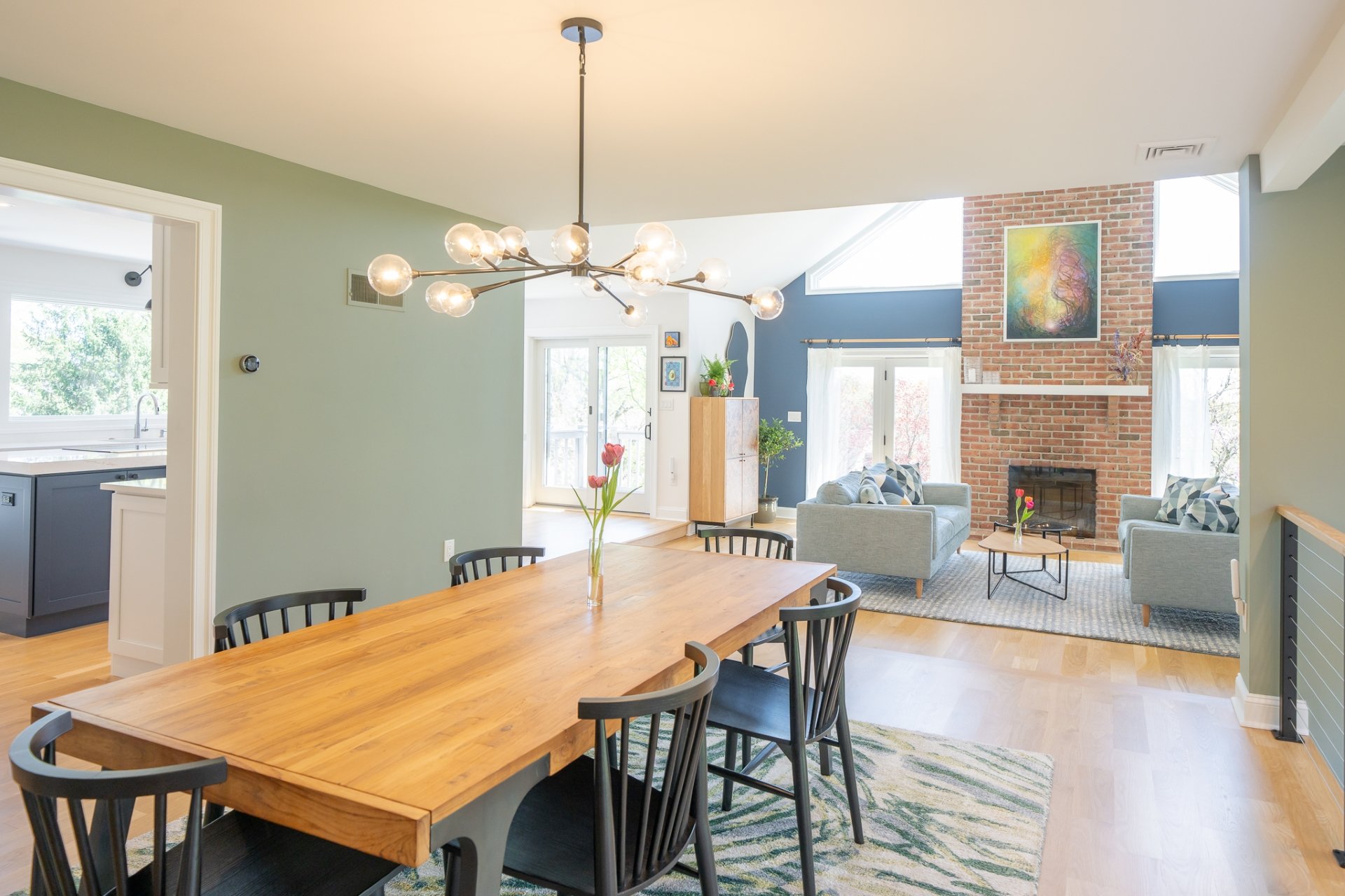 Dining area with green accent wall