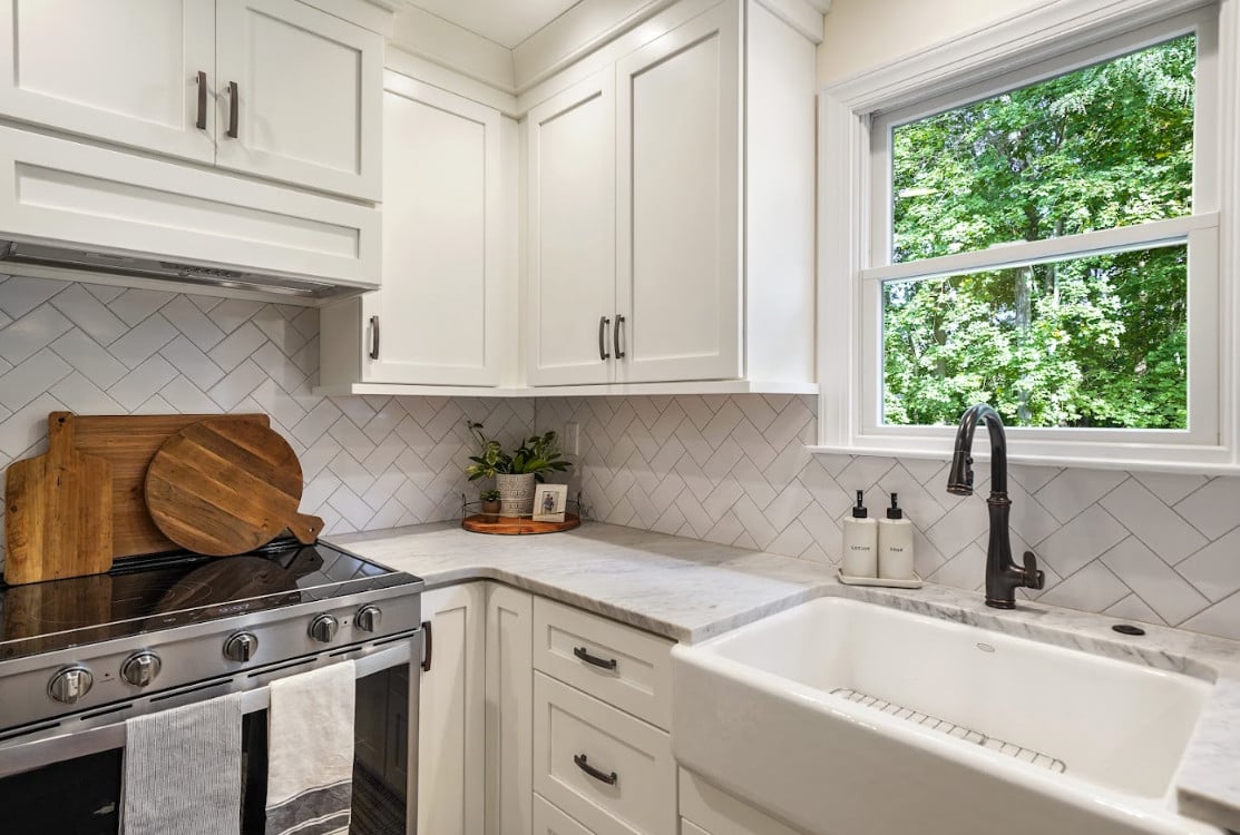 Tile Designs for the Kitchen: 7 Stunning Styles to Elevate Your Space 6 Herringbone Backsplash Tile On A Kitchen Wall