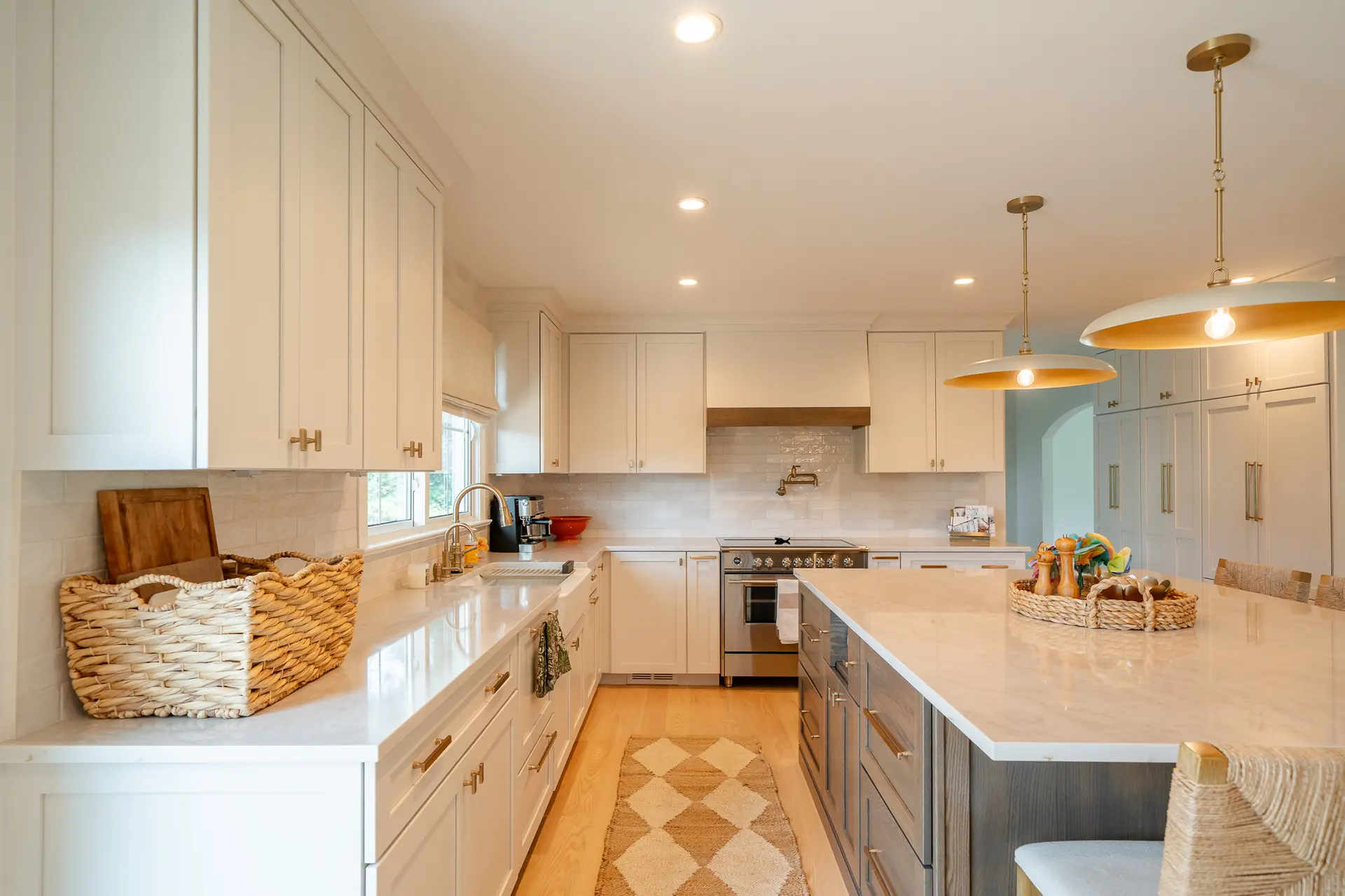 Redesigned mudroom finished with herringbone porcelain brick-style flooring