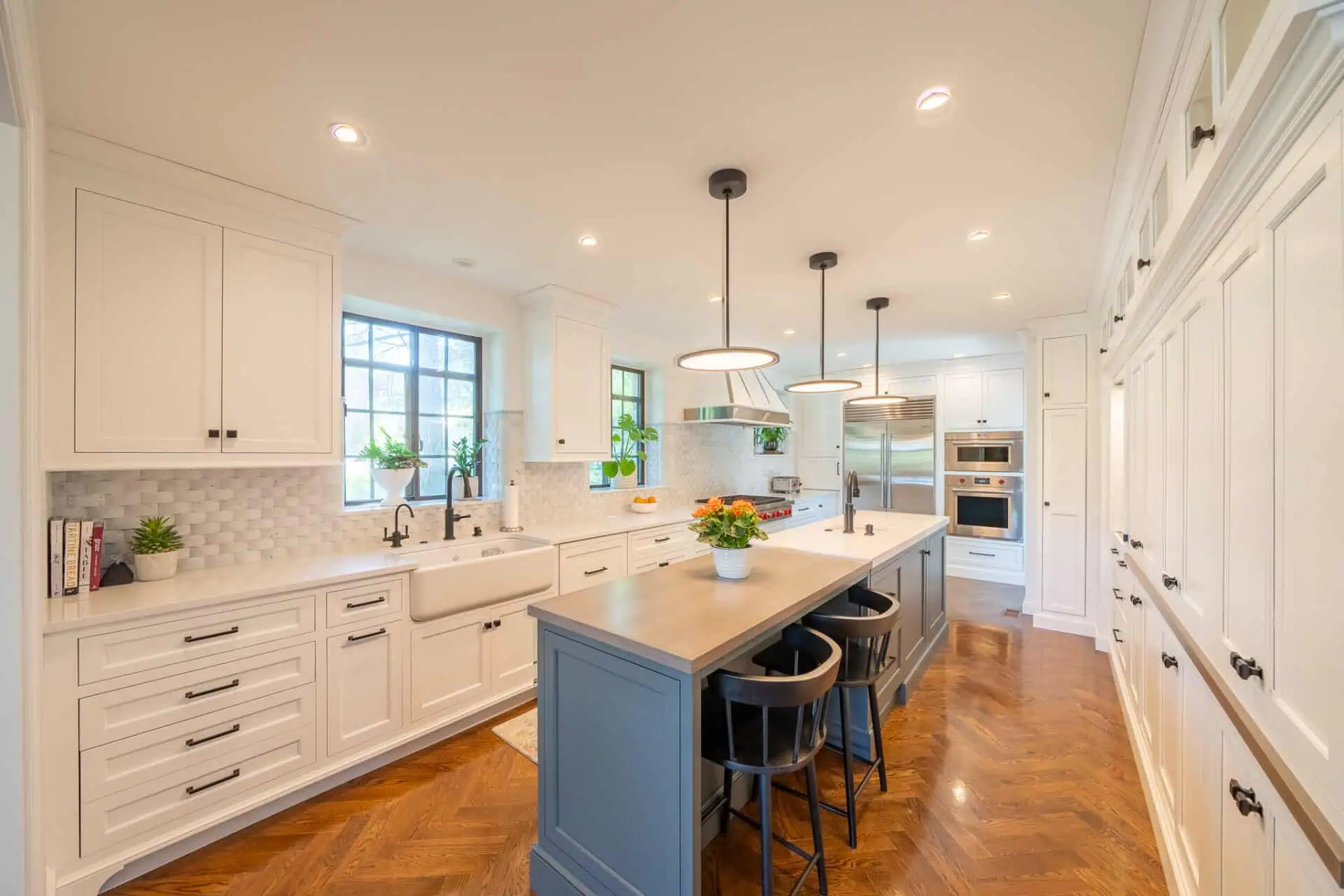 Tile Designs for the Kitchen: 7 Stunning Styles to Elevate Your Space 4 Full Kitchen With Blue-Grey Island, Expanded Backsplash Tiles And Wide Cabinets For Storage