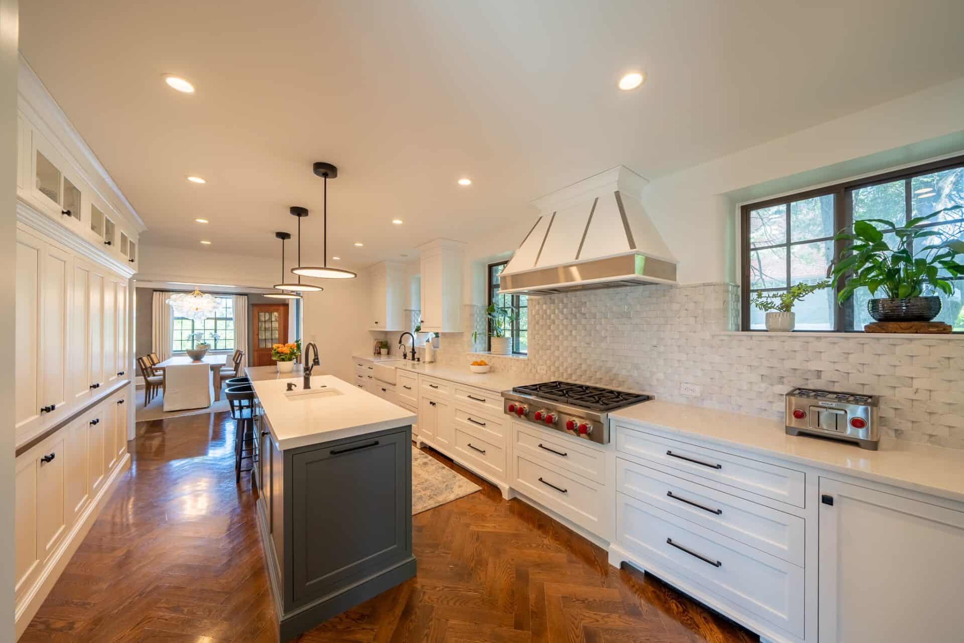 Kitchen with a free standing island that can be used as food prep space