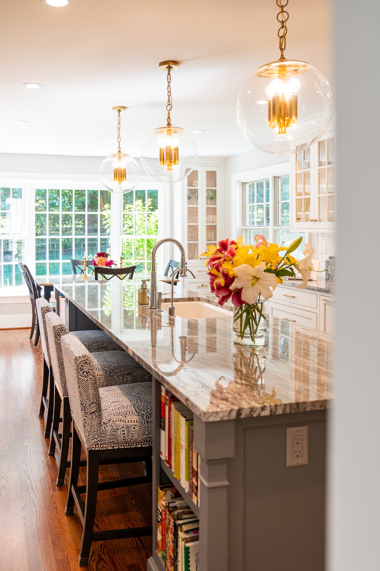 Kitchen with clear glass globe pendants