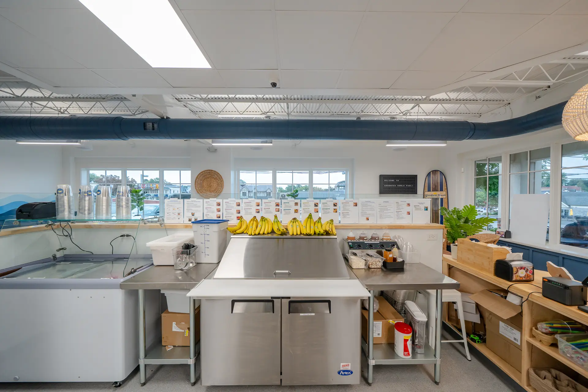 Back-of-house food prep station with new stainless steel counters at Goodness Bowls