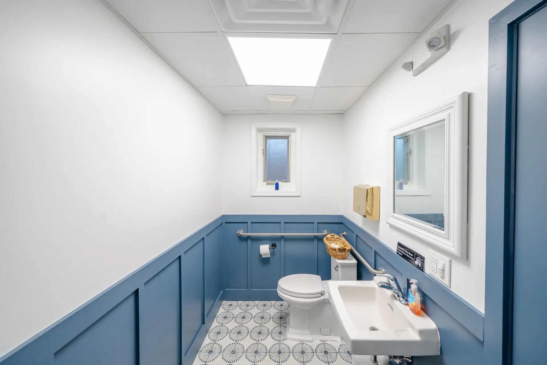 ADA-compliant restroom installed during the Goodness Bowls franchise fit-out