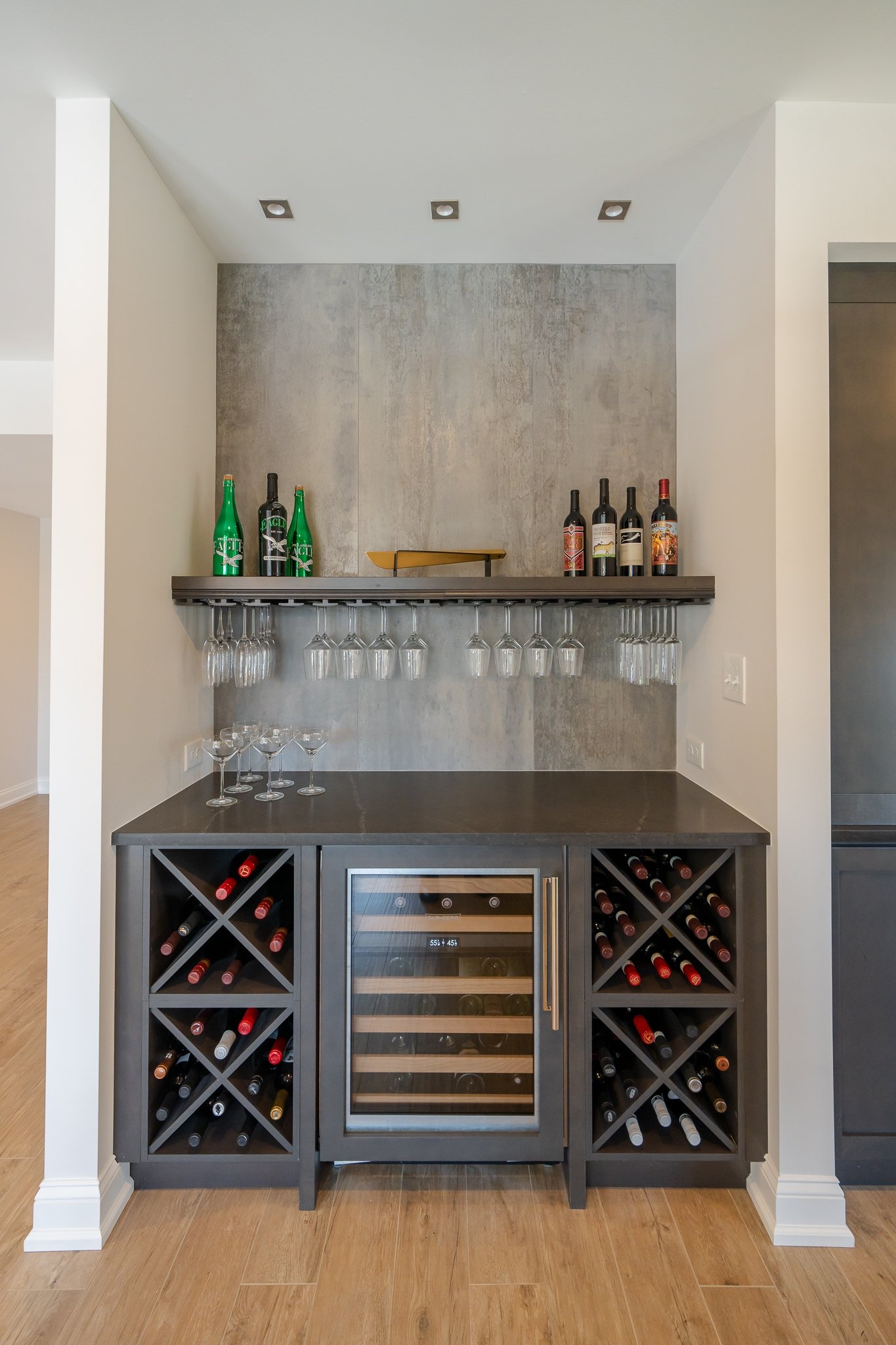 Wine storage nook with wine refrigerator and bottle storage