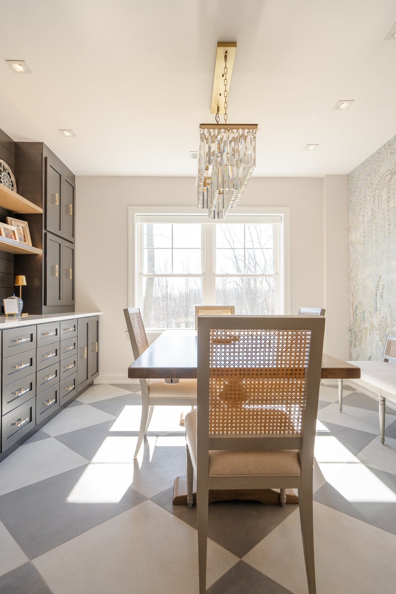 Dining room with contrasting custom cabinets