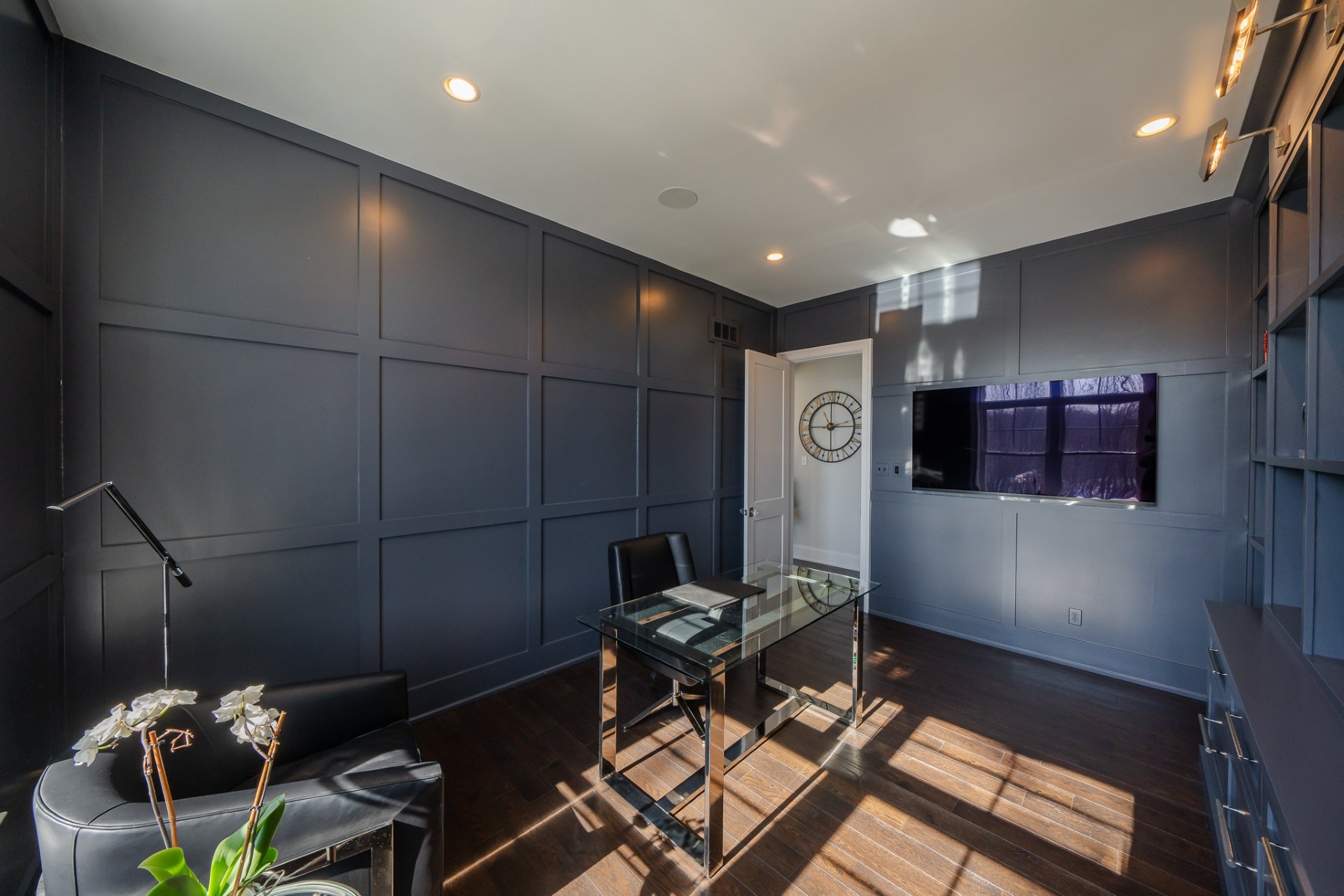 Dark grey paneled home office