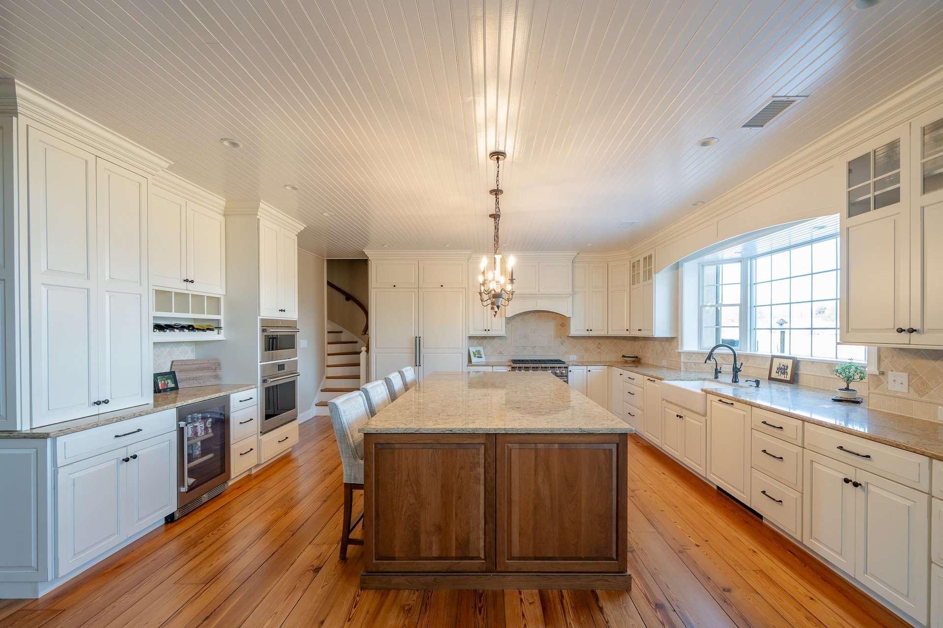 Renovated kitchen with walnut island