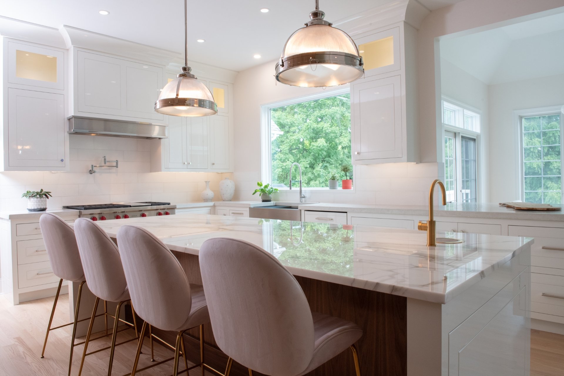 Kitchen island with grey upholstered stools
