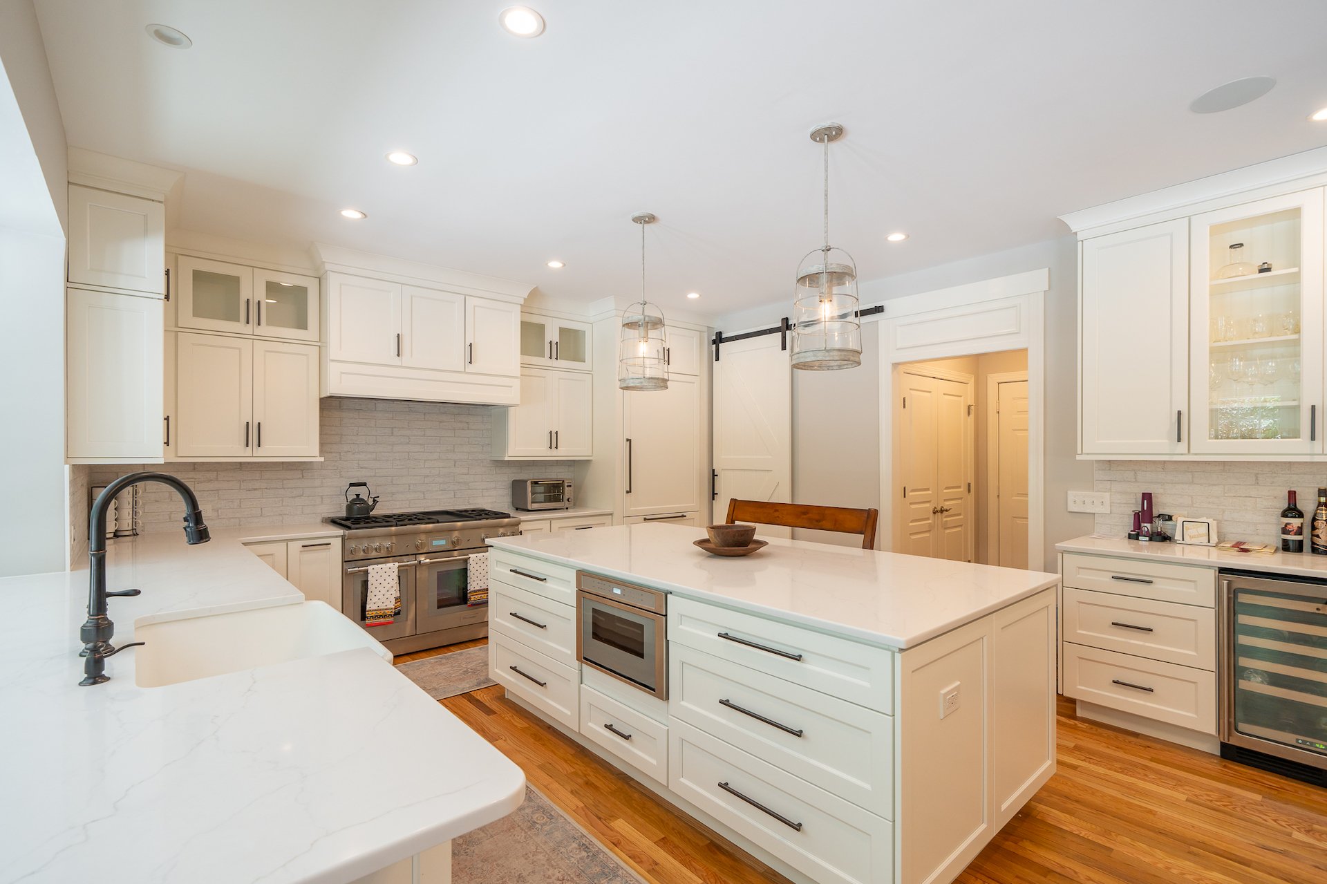 Renovated West Chester kitchen with white cabinetry and island