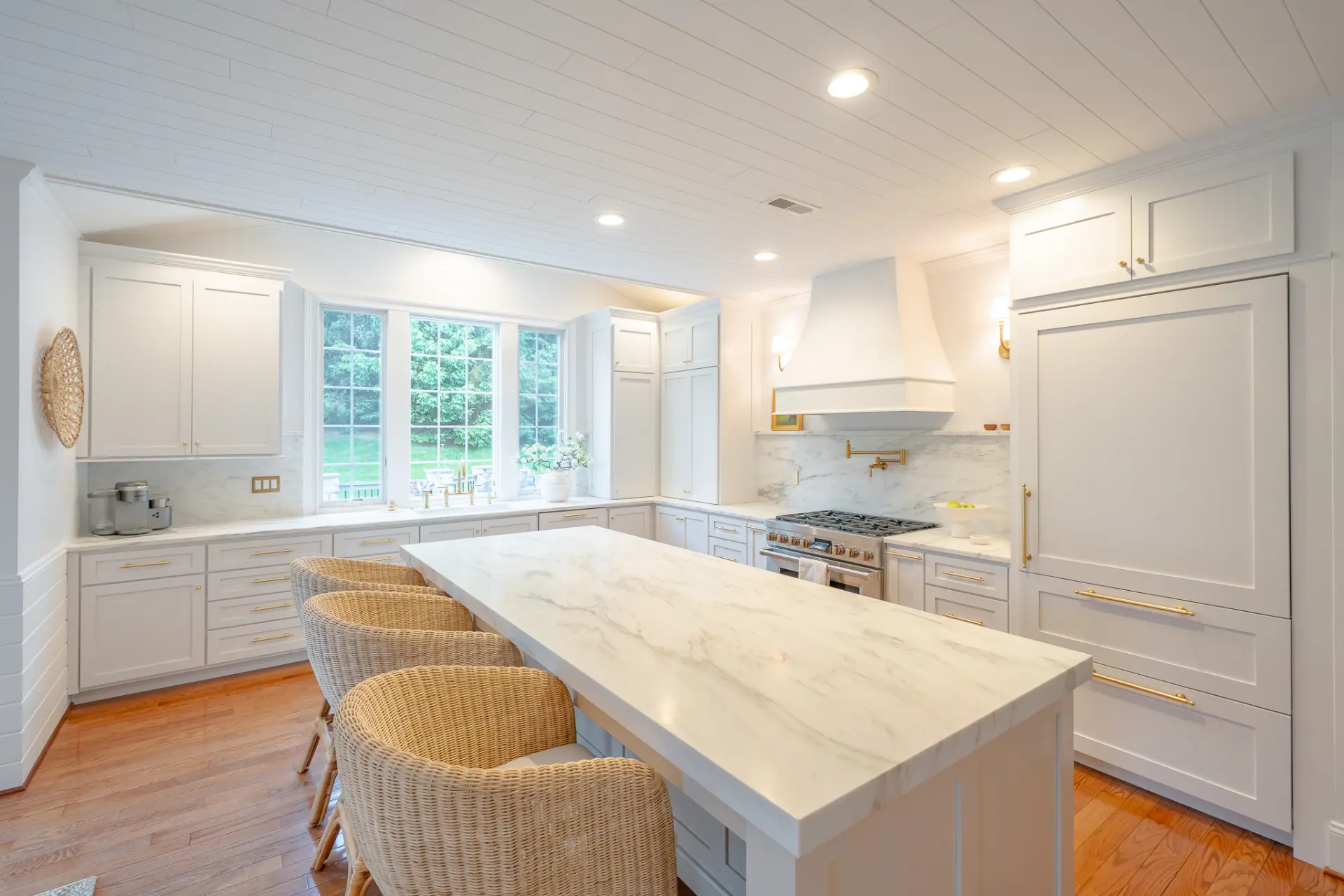 Marble-top counter and multiple cabinets in a kitchen