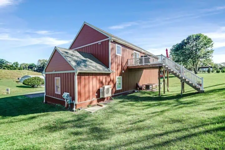 Stairs leading to apartment above 4-car garage